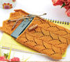 Lace-knitted Kindle Cosy
