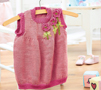 Girl’s knitted pinafore dress