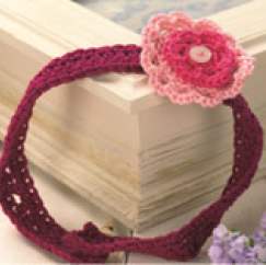 Girl’s crocheted flower headband Knitting Pattern