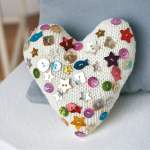Knitted cushion cover, purse, heart and corsage set Knitting Pattern