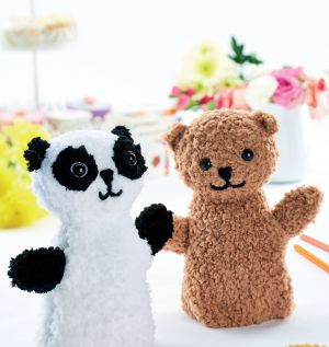 Teddy bear and panda puppets
