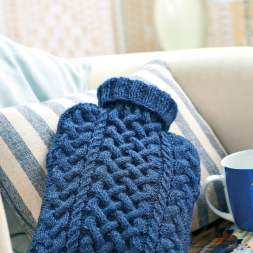 Cabled hot water bottle cover Knitting Pattern