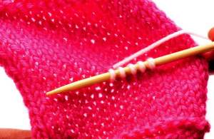 Picking up stitches in the centre of the fabric - Step 3